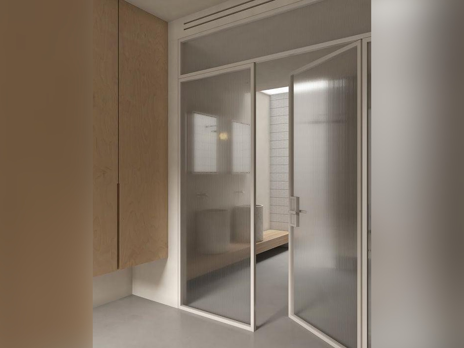 Soft minimalist bathroom with fluted glass screen, warm timber joinery and a stone-look vanity